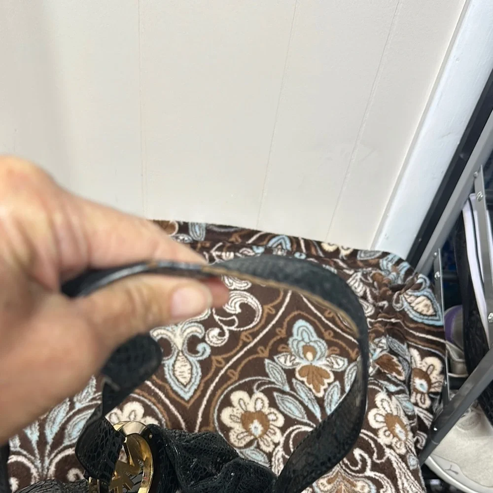 Michael Kors Black Hobo Bag with Gold Emblem